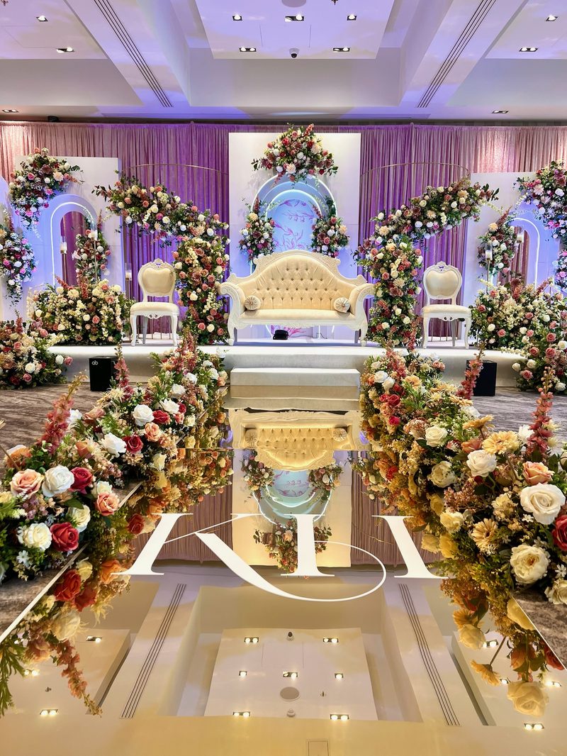 Marble hall with floral arches and chandelier